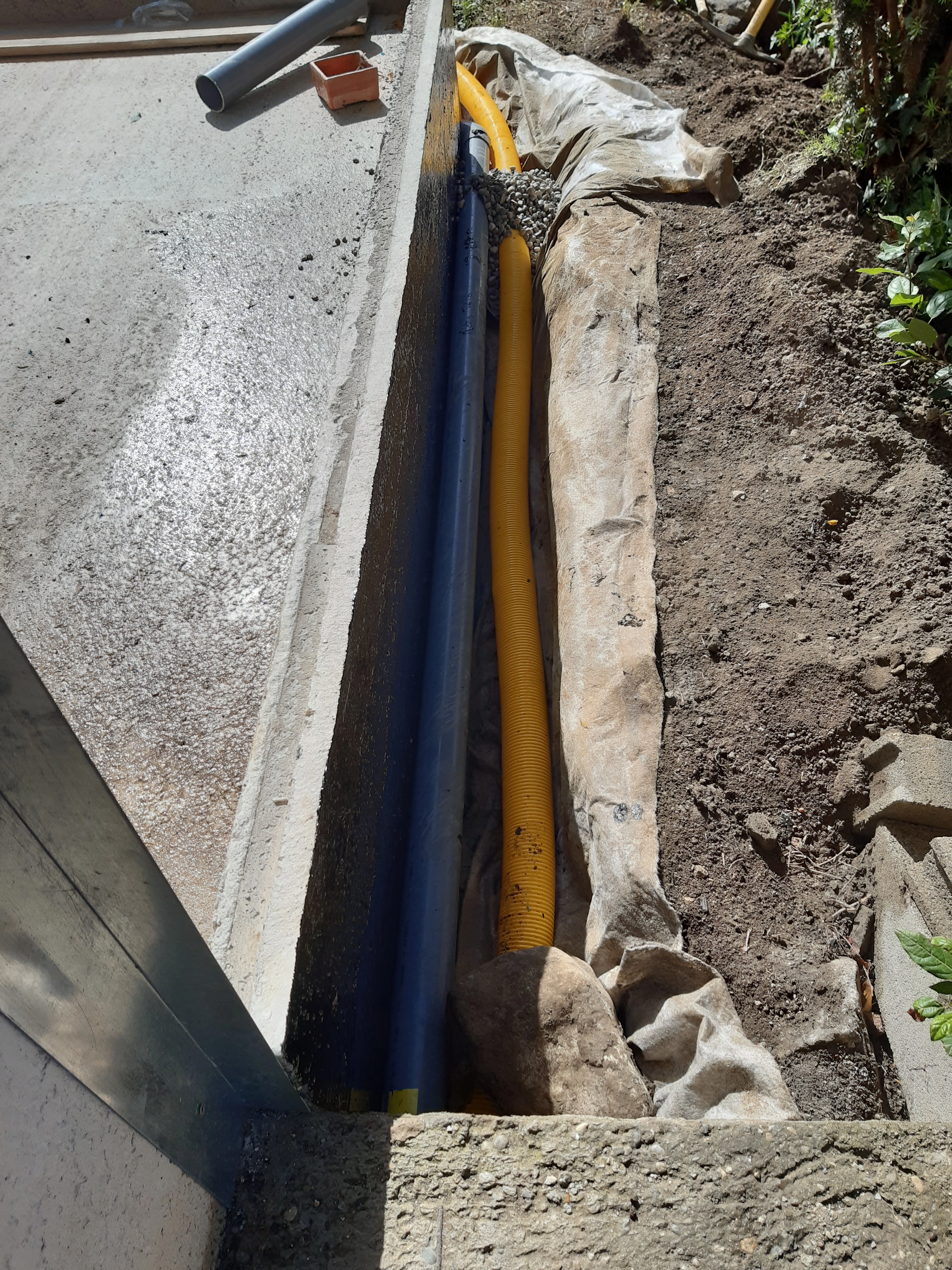 drain;fondation;dallage;extension fondation;vrd,massif béton;création dallage;veranda